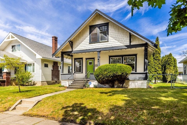 711 E Illinois Ave, Spokane, WA 99207 - bungalow-style home with a porch