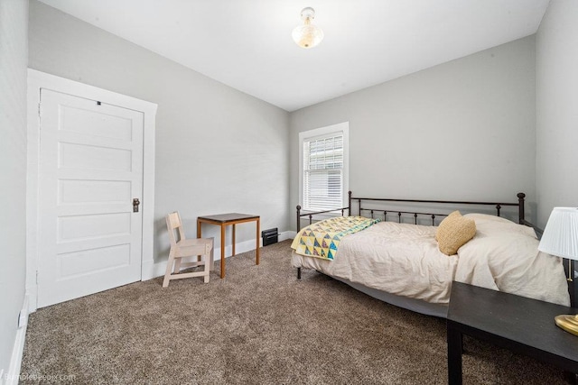 711 E Illinois Ave, Spokane, WA 99207 - carpeted bedroom featuring baseboards