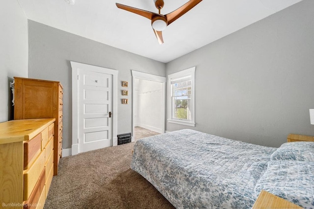711 E Illinois Ave, Spokane, WA 99207 - carpeted bedroom featuring a closet, a ceiling fan, and baseboards