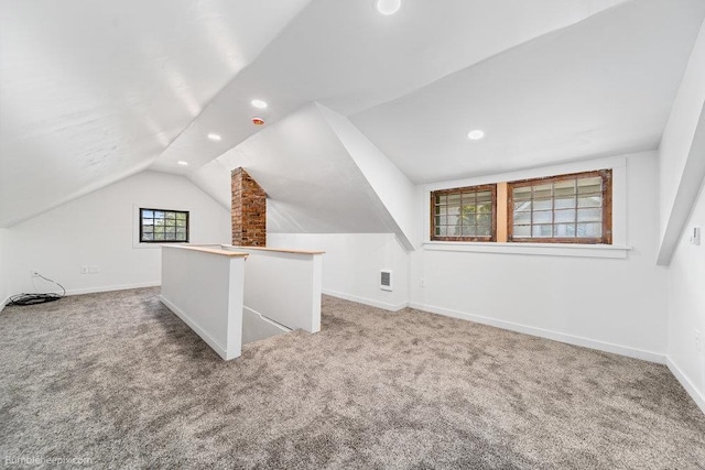 711 E Illinois Ave, Spokane, WA 99207 - additional living space with vaulted ceiling, carpet, recessed lighting, and baseboards