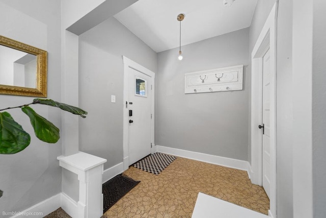 711 E Illinois Ave, Spokane, WA 99207 - mudroom featuring tile patterned floors and baseboards