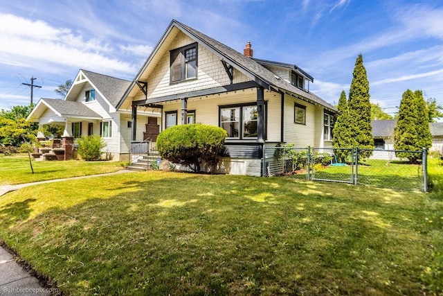 711 E Illinois Ave, Spokane, WA 99207 - view of front of property with covered porch, a gate, and a chimney
