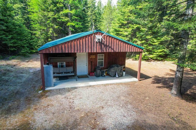 552 Forgotten Trail Rd, Newport, WA 99156 - view of outbuilding featuring a wooded view