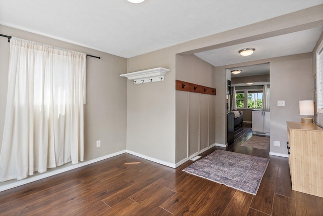 3214 E 29th Ave, Spokane, WA 99223 - entryway with dark wood-type flooring and baseboards