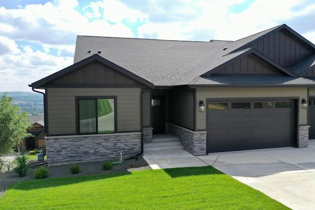 9006 E Clearview Ln, Spokane, WA 99217 - craftsman-style home with stone siding, board and batten siding, driveway, and an attached garage