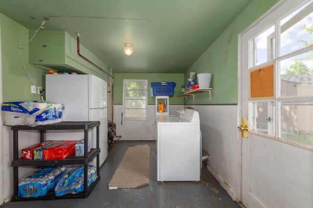 washroom featuring washing machine and dryer