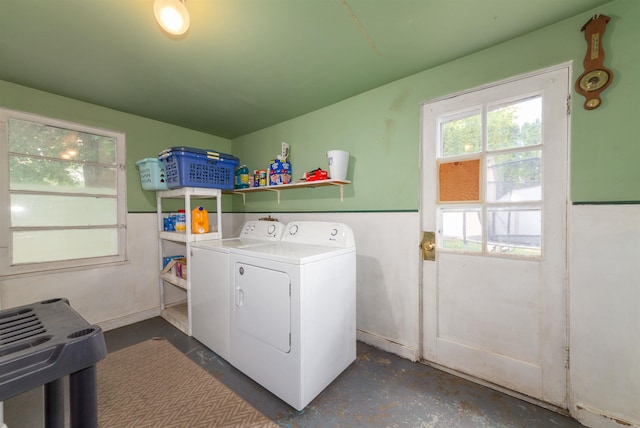 laundry room with washing machine and dryer