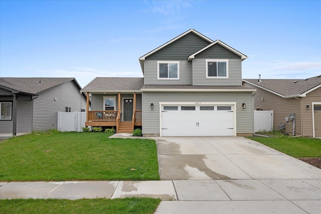 10415 W Salmonberry Rd, Cheney, WA 99004 - view of front facade featuring concrete driveway, a porch, and a garage