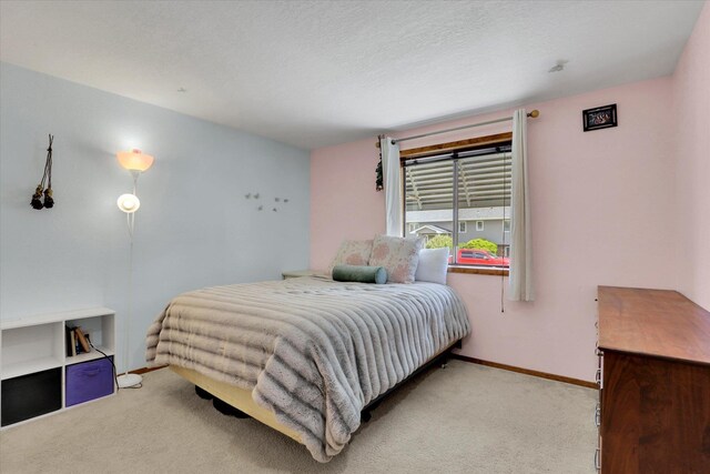 7101 N Greenwood Pl, Spokane, WA 99208 - carpeted bedroom with baseboards