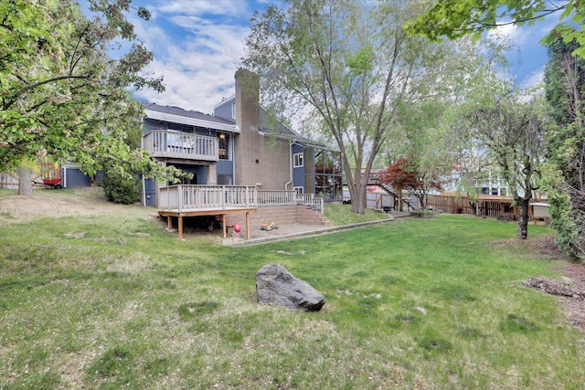7101 N Greenwood Pl, Spokane, WA 99208 - view of grassy yard with a wooden deck