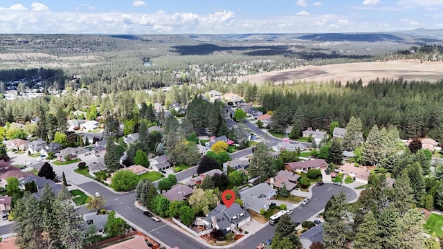 7101 N Greenwood Pl, Spokane, WA 99208 - aerial view of property and surrounding area featuring nearby suburban area and a forest