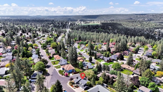 7101 N Greenwood Pl, Spokane, WA 99208 - aerial view of property's location with a heavily wooded area and nearby suburban area
