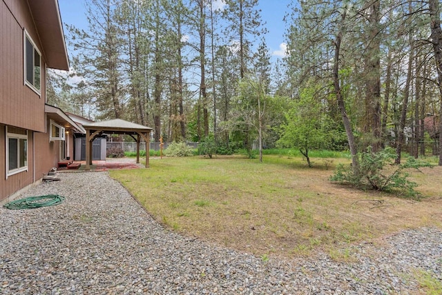 view of yard featuring a gazebo and a patio