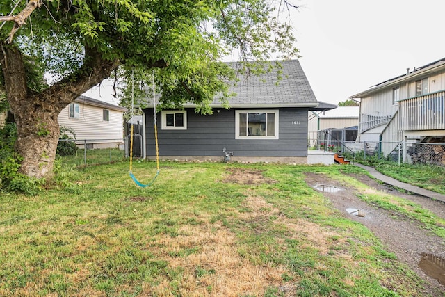 1653 E Ostrander Ave, Spokane, WA 99207 - back of property featuring a shingled roof