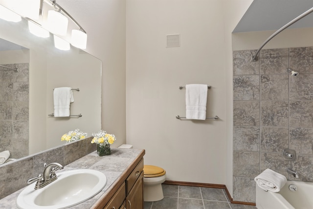 full bath with vanity, shower / bath combination, toilet, and tile patterned flooring