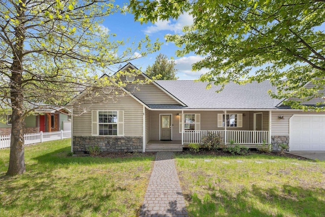 2450 E Black Forest Ave, Post Falls, ID 83854 - view of front of property featuring stone siding, covered porch, a garage, and a shingled roof