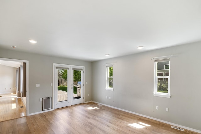2450 E Black Forest Ave, Post Falls, ID 83854 - empty room featuring baseboards, light wood-type flooring, and recessed lighting