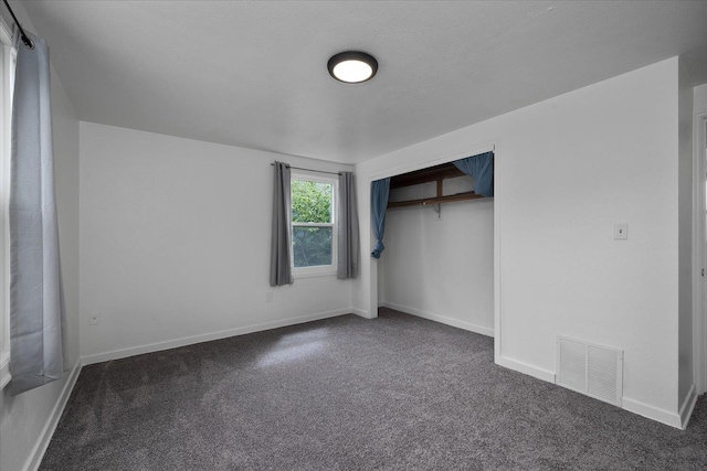 2623 W Olympic Ave, Spokane, WA 99205 - unfurnished bedroom featuring carpet floors and a closet