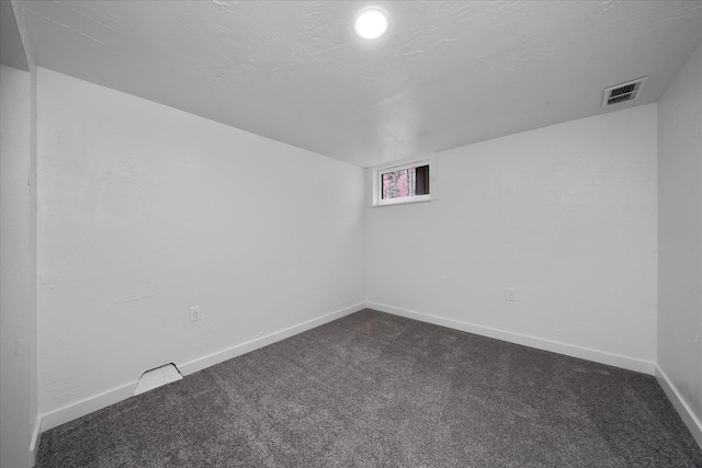 2623 W Olympic Ave, Spokane, WA 99205 - spare room with dark carpet