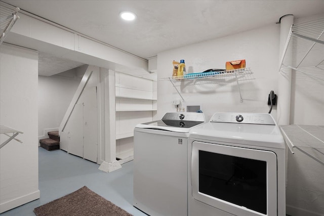 2623 W Olympic Ave, Spokane, WA 99205 - washroom featuring washer and dryer and recessed lighting