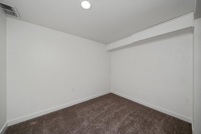 2623 W Olympic Ave, Spokane, WA 99205 - spare room with dark colored carpet and baseboards