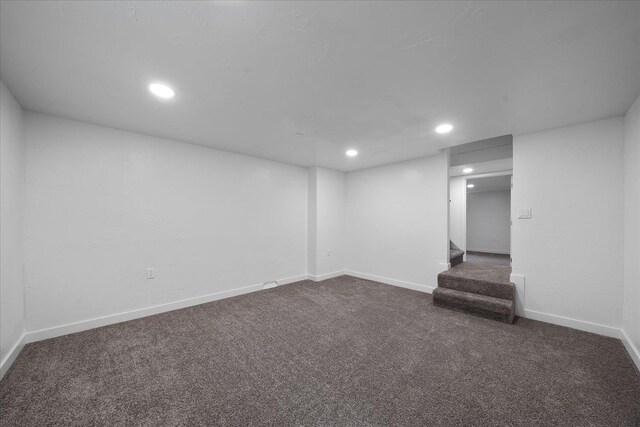 2623 W Olympic Ave, Spokane, WA 99205 - finished below grade area featuring dark carpet, recessed lighting, stairs, and baseboards