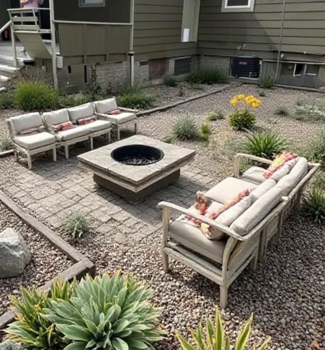 2623 W Olympic Ave, Spokane, WA 99205 - view of yard featuring an outdoor living space with a fire pit and a patio