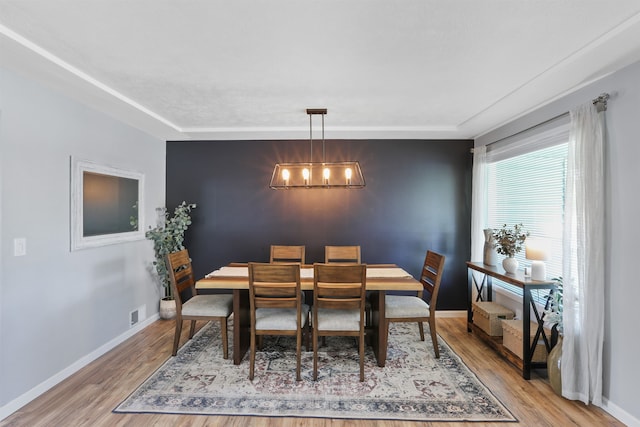 1007 S Bowdish Rd, Spokane Valley, WA 99206 - dining area with light wood-style floors and baseboards