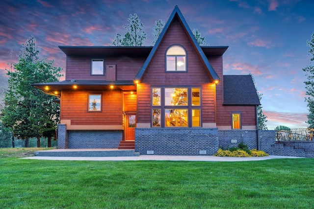 16615 W Stoughton Rd, Cheney, WA 99004 - back of property with a yard and entry steps