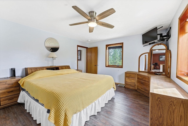 16615 W Stoughton Rd, Cheney, WA 99004 - bedroom with dark wood-style floors, ceiling fan, and baseboards