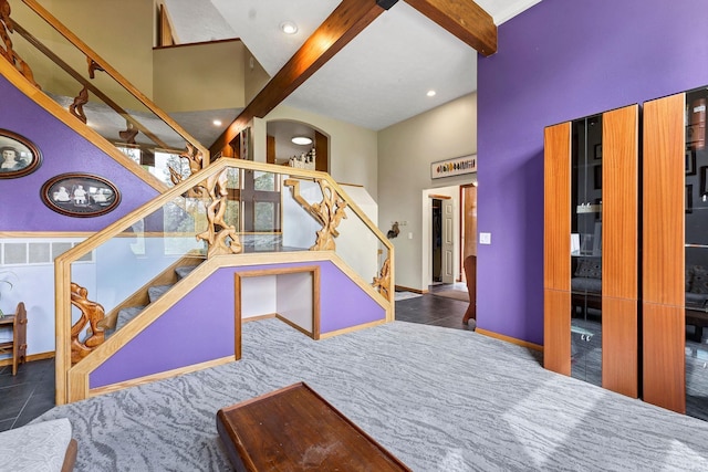 16615 W Stoughton Rd, Cheney, WA 99004 - recreation room featuring a high ceiling, baseboards, tile patterned flooring, recessed lighting, and beamed ceiling