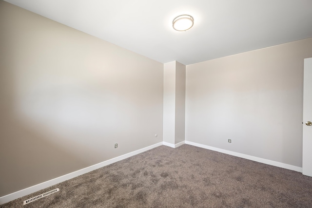 1715 N Jefferson St Unit 1717, Spokane, WA 99205 - carpeted spare room featuring baseboards