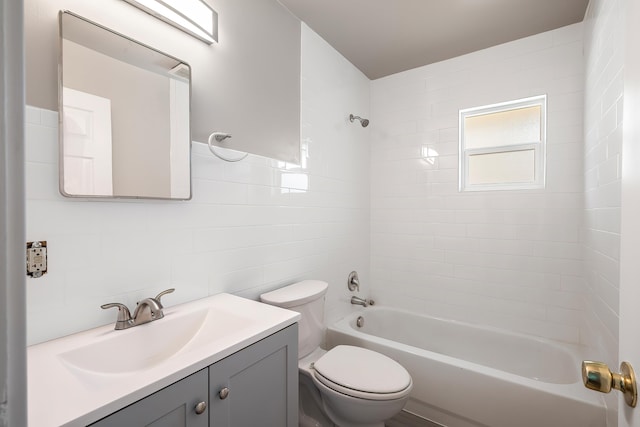 1715 N Jefferson St Unit 1717, Spokane, WA 99205 - full bathroom featuring toilet, bathing tub / shower combination, tile walls, and vanity