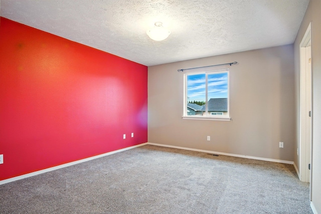 1104 S Comax Ct, Spokane, WA 99224 - carpeted empty room featuring a textured ceiling and baseboards