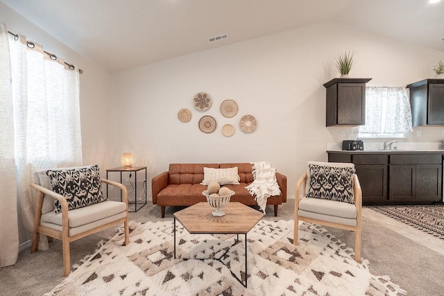 5719 S Lancer Rd, Spokane, WA 99224 - living area with lofted ceiling and light carpet
