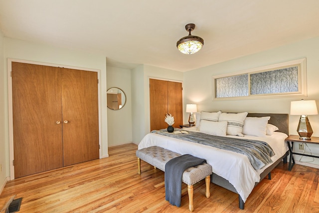 2033 S Rebecca St, Spokane, WA 99223 - bedroom with light wood finished floors and two closets