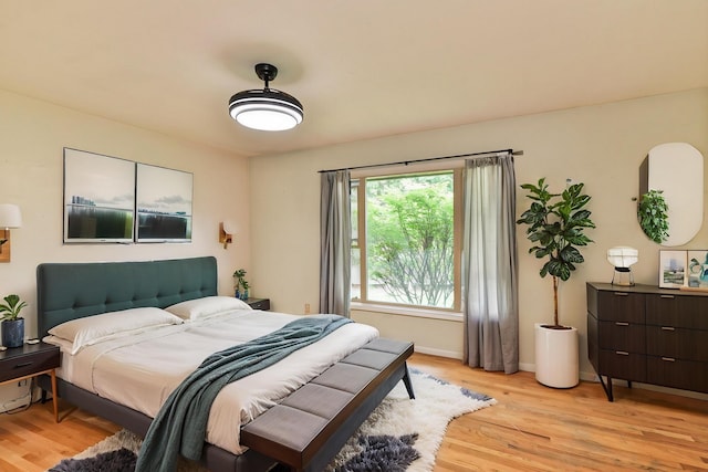 2033 S Rebecca St, Spokane, WA 99223 - bedroom featuring light wood-style floors and baseboards