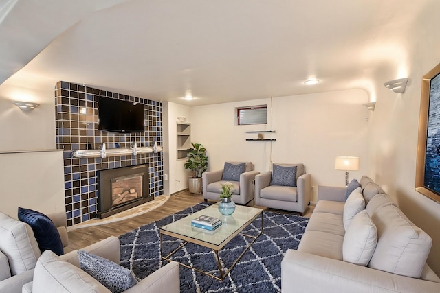 2033 S Rebecca St, Spokane, WA 99223 - living room featuring wood finished floors and a tile fireplace