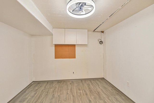 2033 S Rebecca St, Spokane, WA 99223 - empty room featuring light wood-style floors
