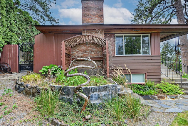 2033 S Rebecca St, Spokane, WA 99223 - exterior space with a chimney