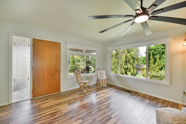 2033 S Rebecca St, Spokane, WA 99223 - living area with wood finished floors, baseboards, and ceiling fan