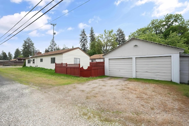 detached garage with fence