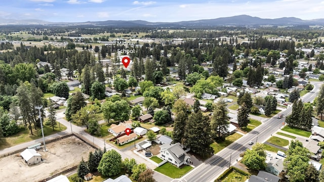 aerial perspective of suburban area featuring a mountainous background