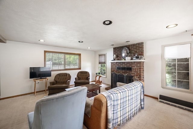 carpeted living room featuring recessed lighting, baseboards, and a brick fireplace