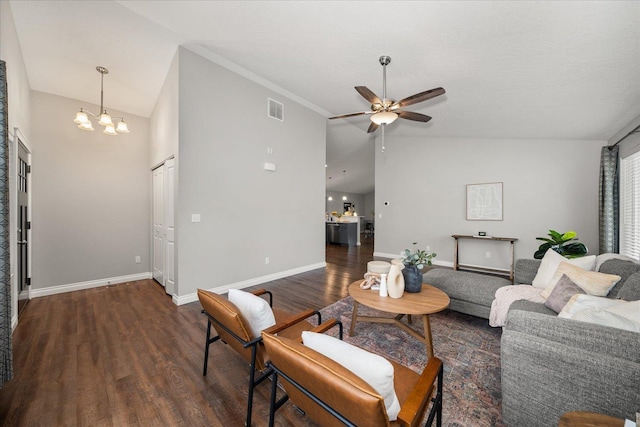 living area featuring wood finished floors, a chandelier, ceiling fan, baseboards, and high vaulted ceiling