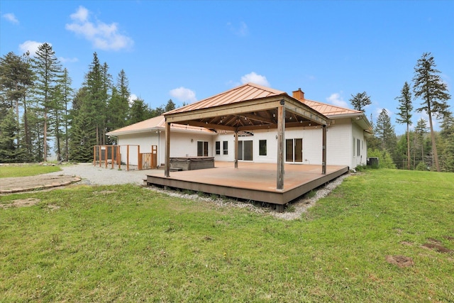 30915 N Chipmunk Rd, Chattaroy, WA 99003 - rear view of property featuring a hot tub, a gazebo, a chimney, metal roof, and a deck