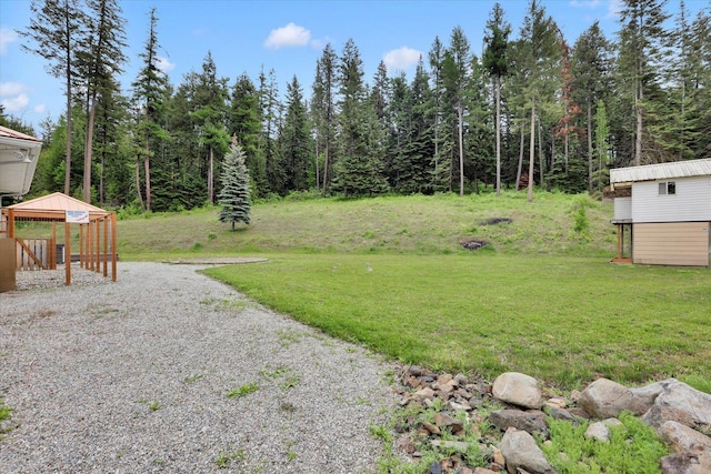 30915 N Chipmunk Rd, Chattaroy, WA 99003 - view of green lawn with a forest view