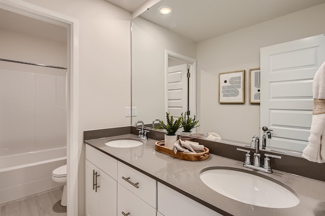 3029 S Coulter Ln, Spokane Valley, WA 99037 - full bath featuring toilet, double vanity, recessed lighting, and bathing tub / shower combination