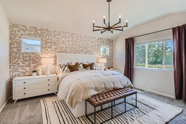 3029 S Coulter Ln, Spokane Valley, WA 99037 - bedroom featuring wallpapered walls, baseboards, a chandelier, an accent wall, and carpet flooring