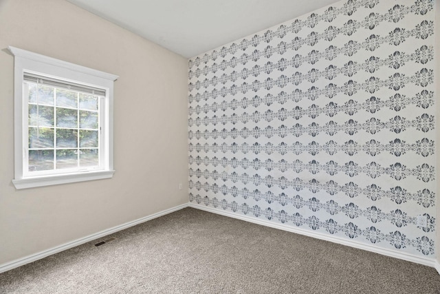 2212 W Gardner Ave, Spokane, WA 99201 - carpeted empty room featuring baseboards